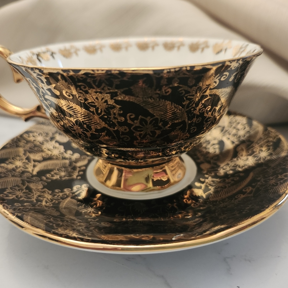 ELIZABETHAN STAFFORDSHIRE teacup &saucer Gold &black Leaf Design